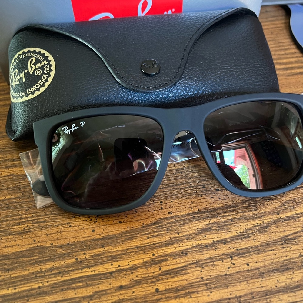 Ray-Ban Justin’s RB4165 622/T3 Black Frame w/ Light Grey Gradient lenses.